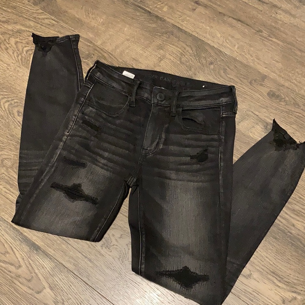 AE Next Level Stretch black distressed jeans